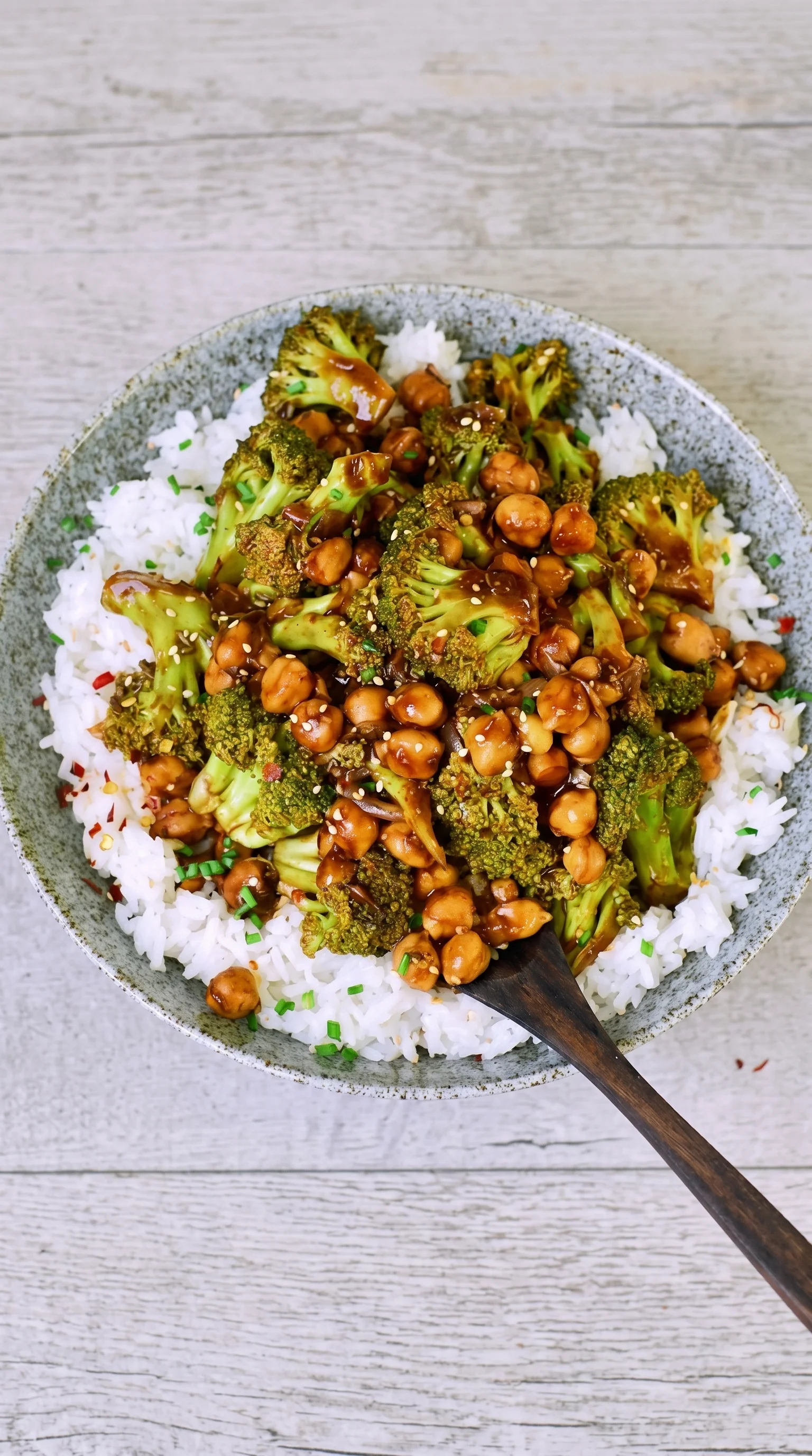 A bowl of broccoli and rice.